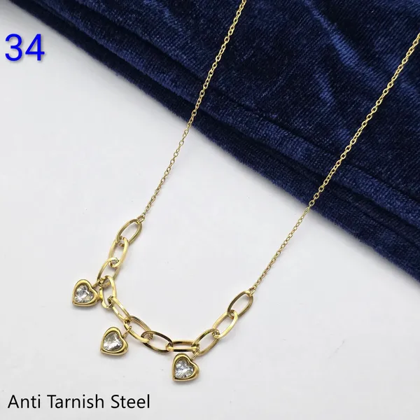 Gold_Steel_Cz_Stone_Heart_Charm_Necklace_For_Women