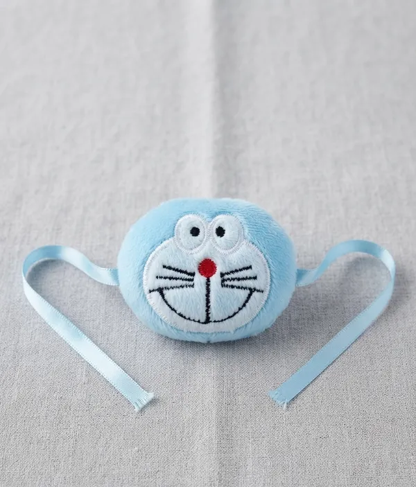 Blue_Plush_Doraemon_Cartoon_Face_Rakhi_for_Kids