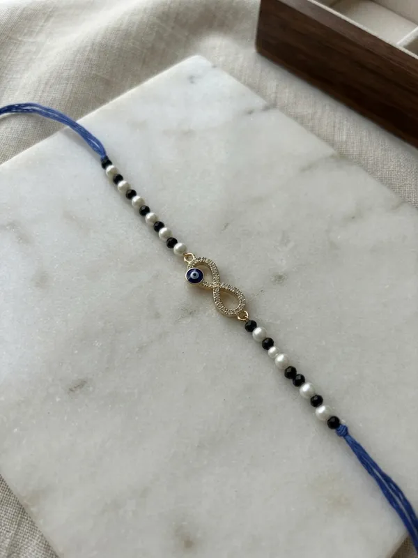 Blue_Thread_Beaded_Evil_Eye_Rakhi_for_Brothers