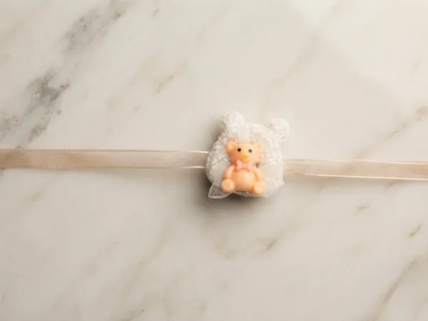 Cream_Ribbon_Teddy_Bear_Kids_Rakhi