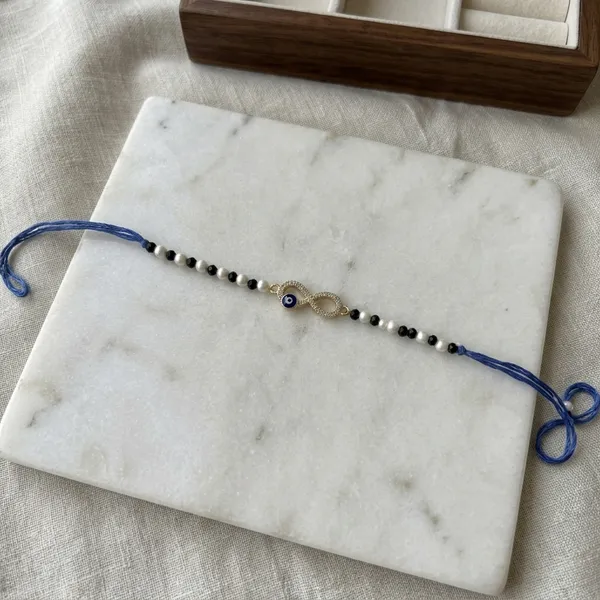 Blue_Thread_Beaded_Evil_Eye_Rakhi_for_Brothers