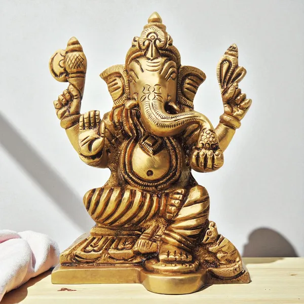 Brass_Showpiece_Ganesh_Ji_Statue_-_3.5x2.5x4_Inch_(BS1315_G)