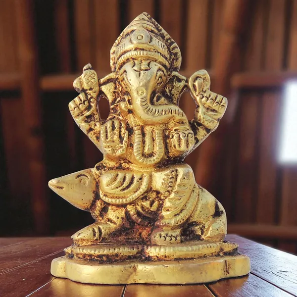 Brass_Showpiece_Ganesh_Ji_God_Idol_Statue_-_2x1.2x2.5_Inch_(BS1614_G)