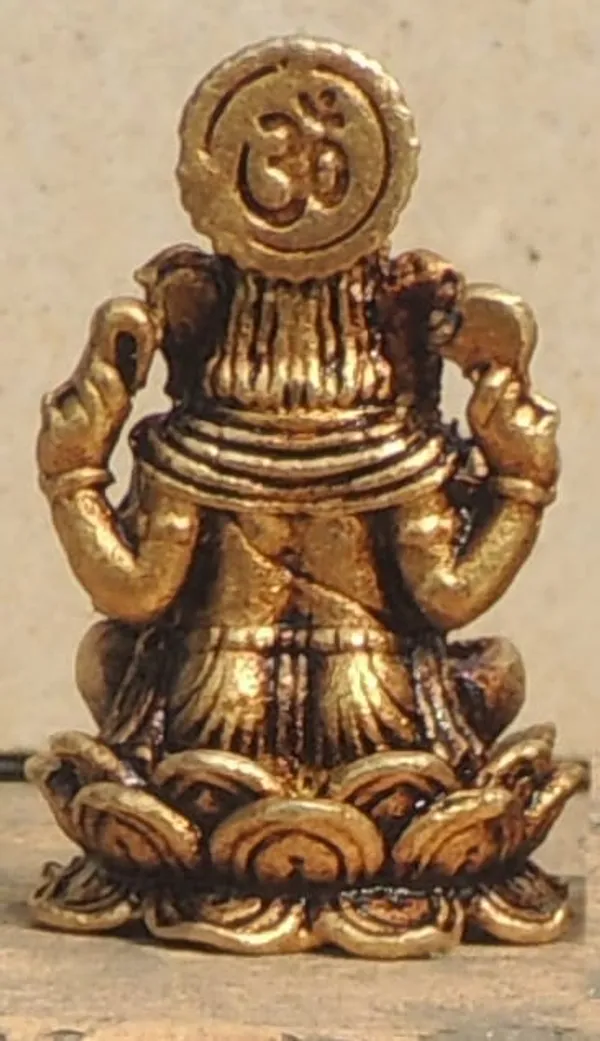 Brass_Showpiece_Ganesh_Ji_God_Idol_Statue_-_0.7x0.7x1.3_Inch_(BS1687_G)