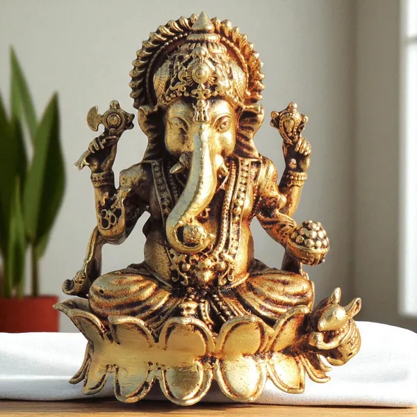 Brass_Showpiece_Ganesh_Ji_God_Idol_Statue_-_2.2x2x2.5_Inch_(BS1704_G)
