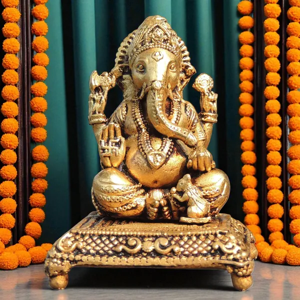 Brass_Showpiece_Ganesh_Ji_God_Idol_Statue_-_2x2x2.5_Inch_(BS1775_G)