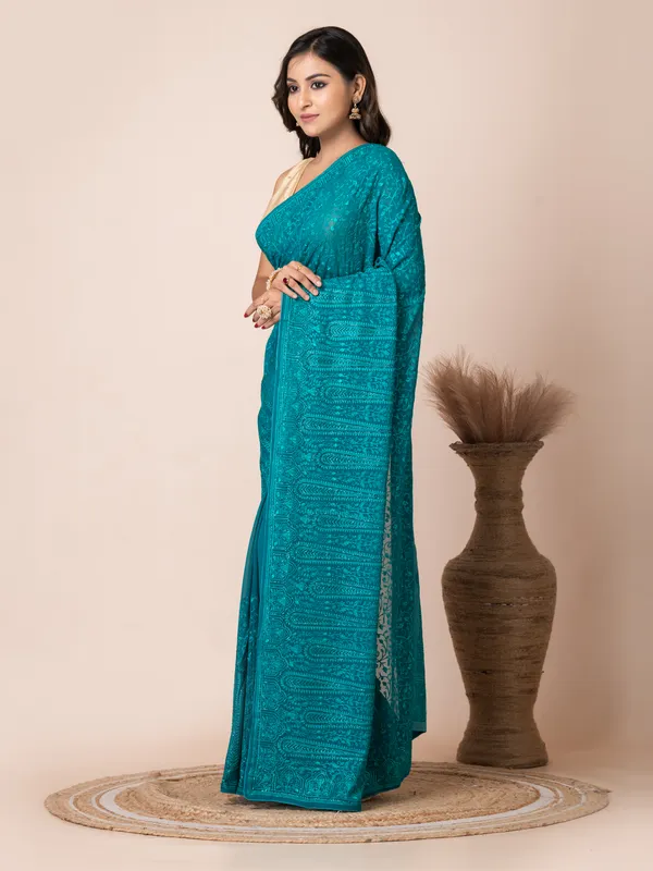 Stunning_Turquoise_Fancy_Chiffon_Saree_with_Jal_Work