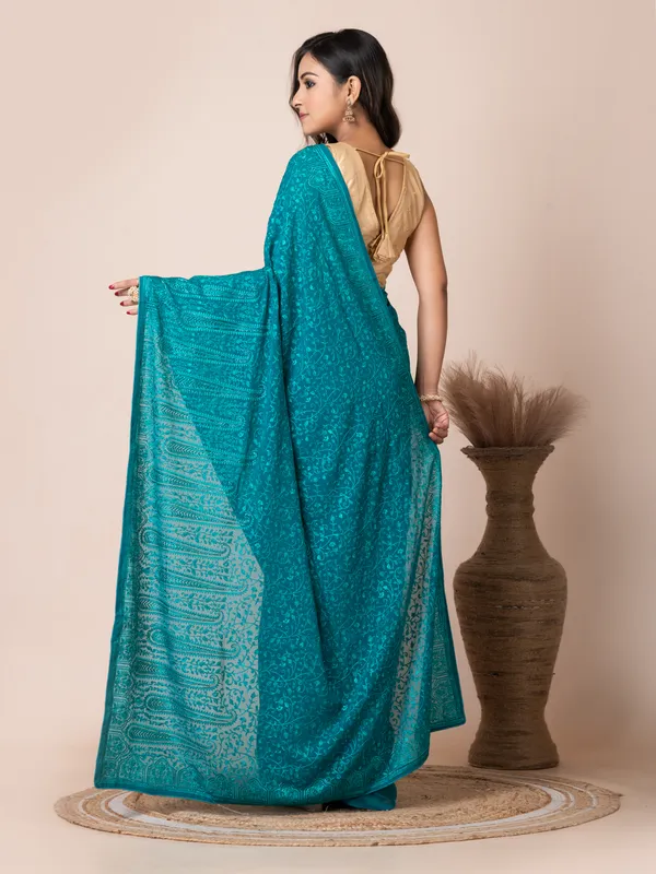 Stunning_Turquoise_Fancy_Chiffon_Saree_with_Jal_Work