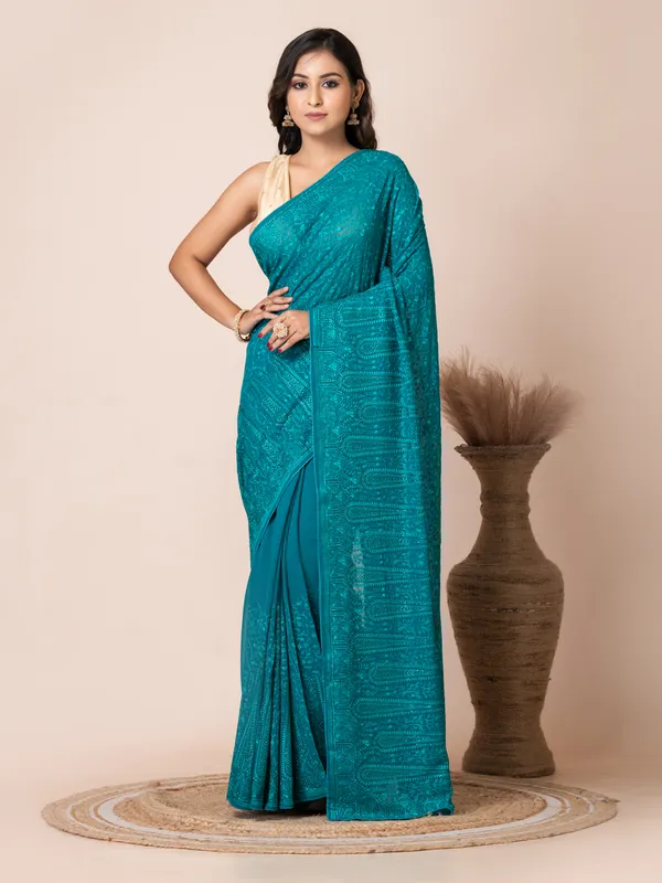 Stunning_Turquoise_Fancy_Chiffon_Saree_with_Jal_Work