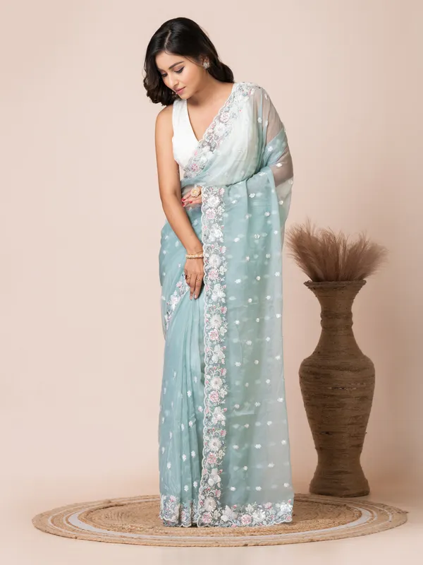 Elegant_Mint_Green_Organza_Tissue_Saree_with_Floral_Embroidery