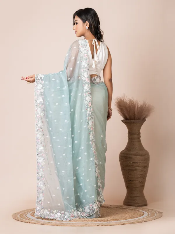 Elegant_Mint_Green_Organza_Tissue_Saree_with_Floral_Embroidery