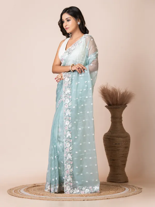Elegant_Mint_Green_Organza_Tissue_Saree_with_Floral_Embroidery