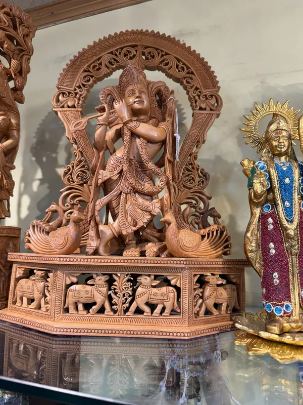 Carved_Wooden_Krishna_Flute_Playing_Idol_With_Ornate_Arch