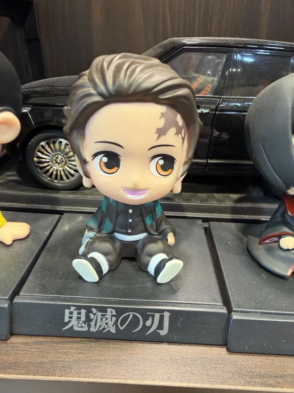 Brown_Hair_Anime_Style_Seated_Character_Figurine