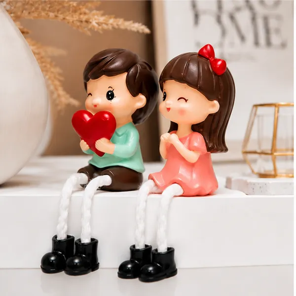 Polyresin_Pastel_Hand_Painted_Sitting_Couple_Figurine