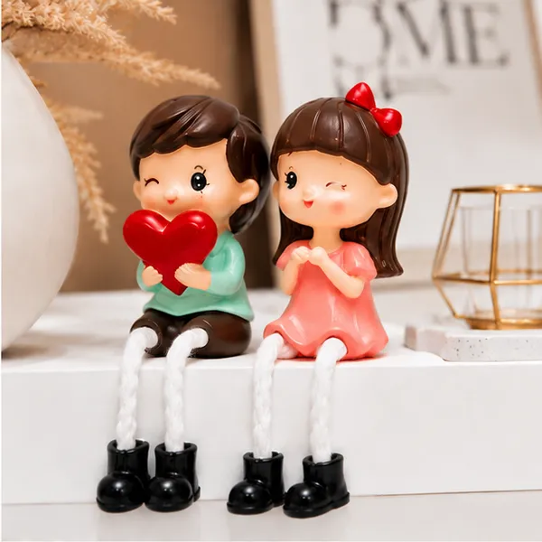 Polyresin_Pastel_Hand_Painted_Sitting_Couple_Figurine