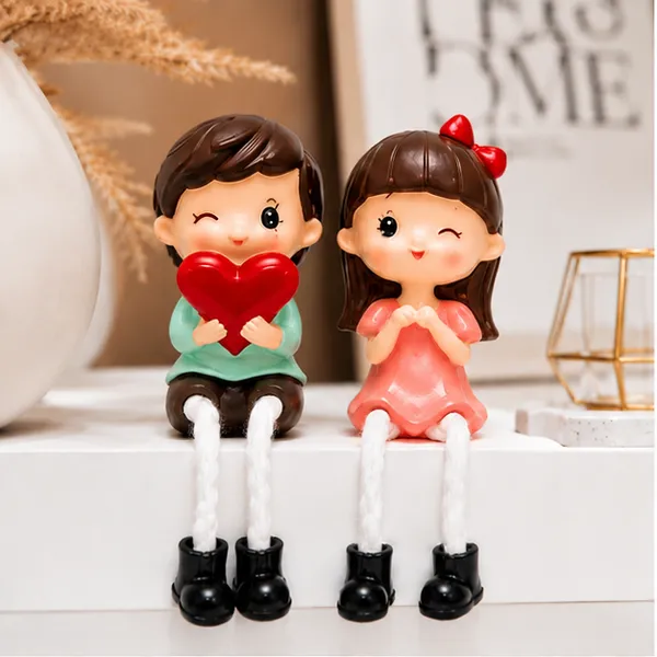 Polyresin_Pastel_Hand_Painted_Sitting_Couple_Figurine