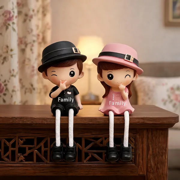 Polyresin_Family_Theme_Hat_Wearing_Couple_Showpiece