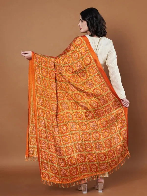 Orange_Chinon_Crushed_Bandhani_Printed_Dupatta_With_Tassels_For_Women