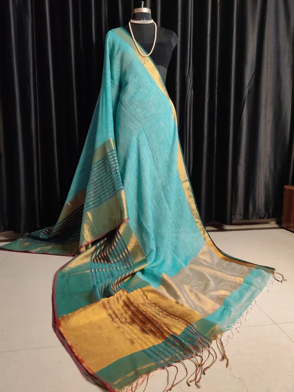 Linen_Saree_With_Copper_Zari_Border_And_Blouse_Piece