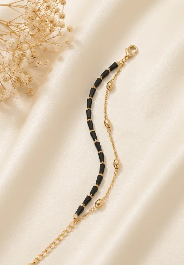 Black_Beaded_Gold_Tone_Bracelet_for_Women