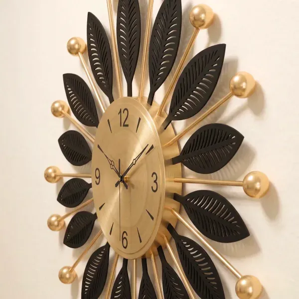 Decorative_Sunburst_Wall_Clock_with_Black_Leaf_Design_-_60cm_Diameter