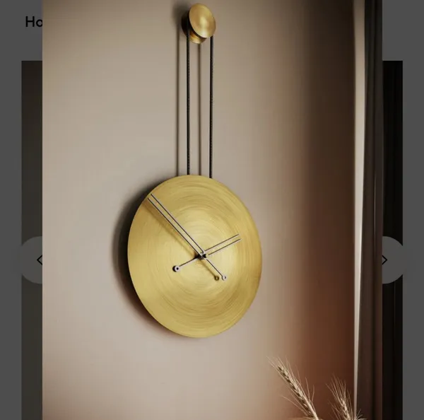 Iron_Minimalist_Gold-Tone_Pendulum_Wall_Clock