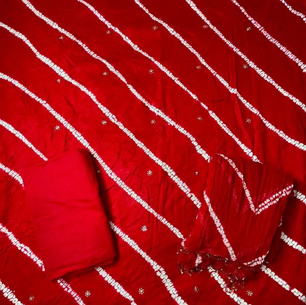 Chevron_Unstitched_Bandhej_Cotton_Suit_Red_Bandhani_Suit_Set_with_Mirror_Work_&_Tassel_Dupatta