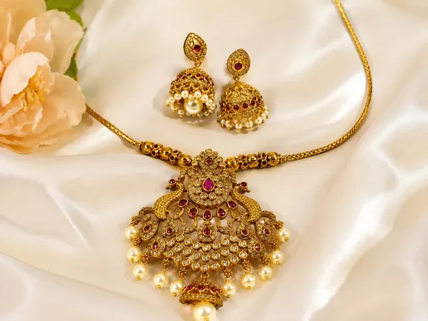 Golden_Alloy_Traditional_Pendant_Necklace_And_Earrings_Set_For_Women