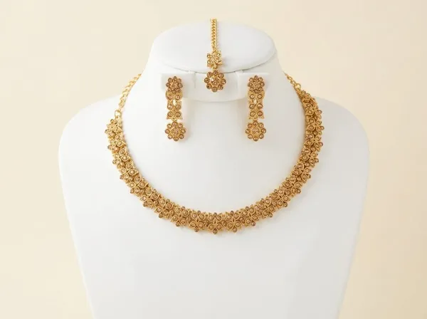 Golden_Alloy_Floral_Motif_Necklace_Earrings_Maang_Tikka_Set_For_Women