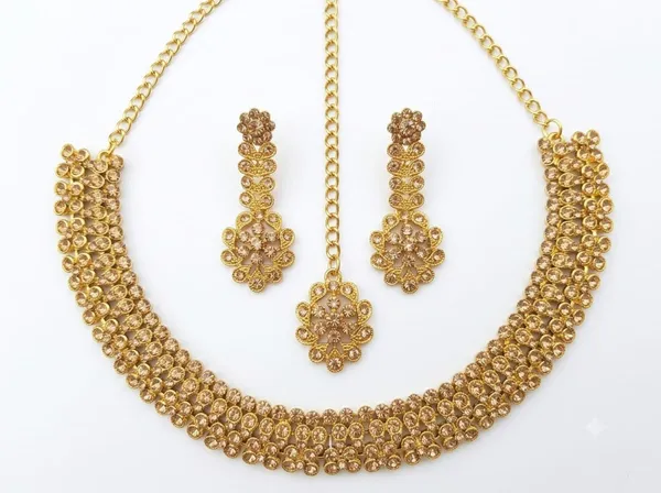Golden_Alloy_Traditional_Floral_Necklace_Earrings_Maang_Tikka_Set_For_Women