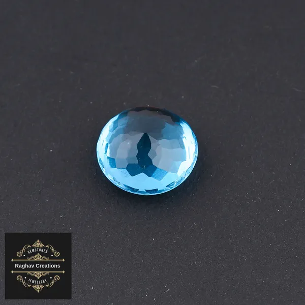 Blue_Topaz_11.47_Carat_Dimension_13.34*13.38*7.42_MM_certificate_number:-208292