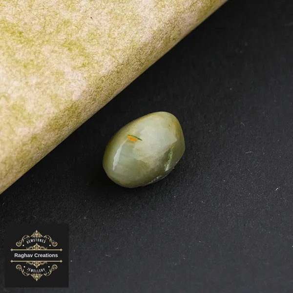 Cat's_Eye_Stone_weight_-4.10_Carat_Certificate_Number:-208508