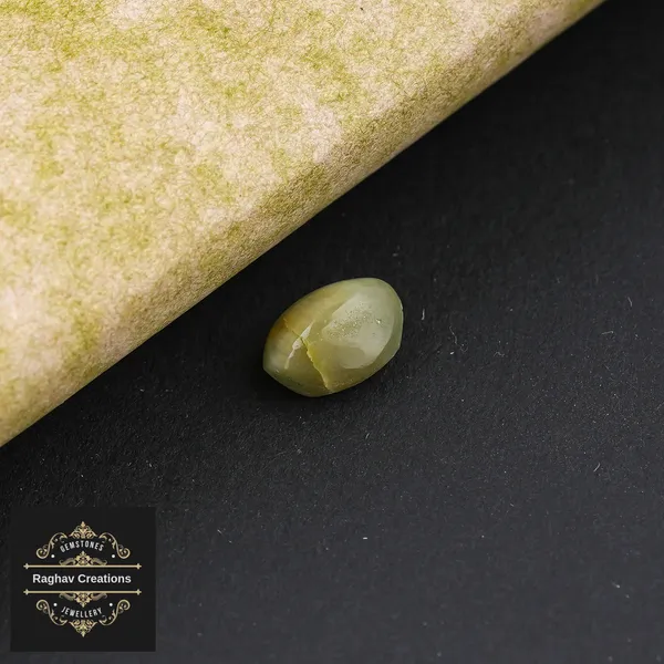 Cat's_eye_Gemstone_weight_-_2.42_Carat_Certificate_Number:-_208503