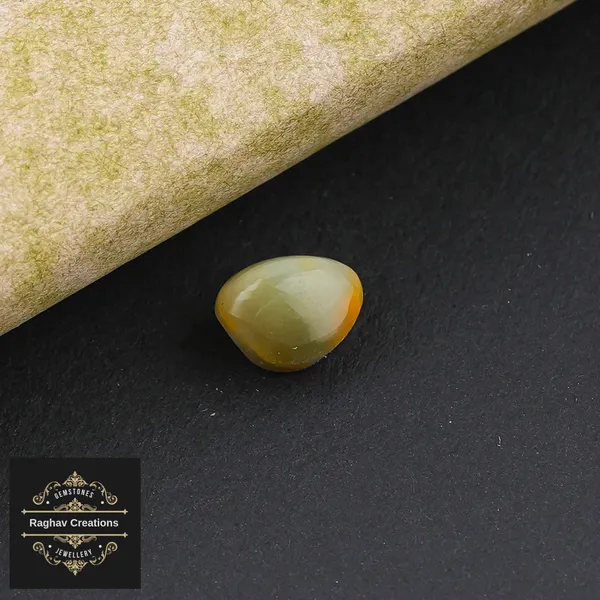 Cat's_eye_Gemstone_weight_-_2.54_Carat_Certificate_Number_208510