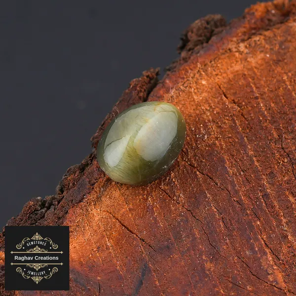 Cat's_eye_Gemstone_weight_-_6.91_Carat_Certificate_Number:-208509