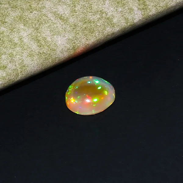 Natural_Double_Side_Fire_Opal_ethopian_6.00_Carat_certificate_Number:-_593051