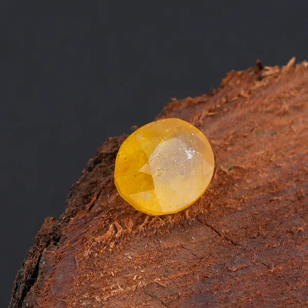Natural_Yellow_Sapphire_6.25_Carat_Certificate_number:-_592995