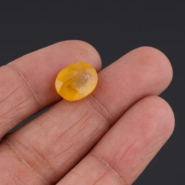 Natural_Yellow_Sapphire_6.25_Carat_Certificate_number:-_592995