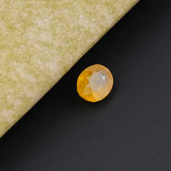 Natural_Yellow_Sapphire_6.25_Carat_Certificate_number:-_592995