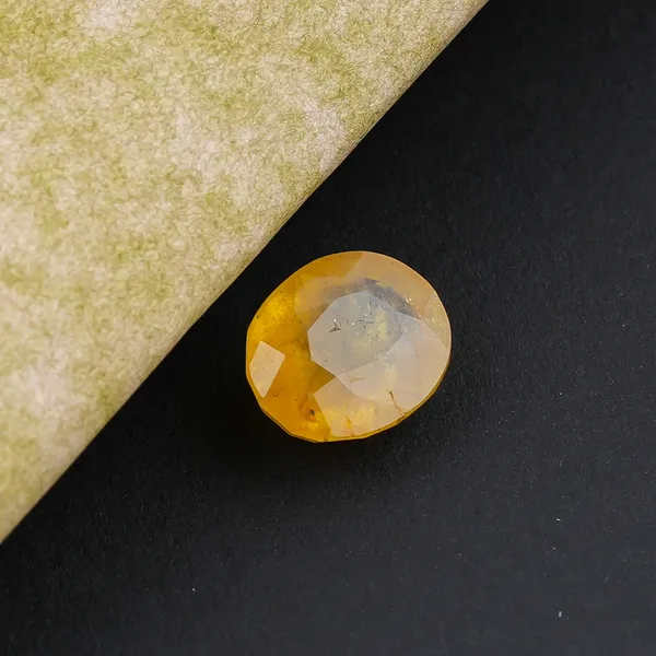 Natural_Yellow_Sapphire_7.00_Carat_certificate_number:-_592994
