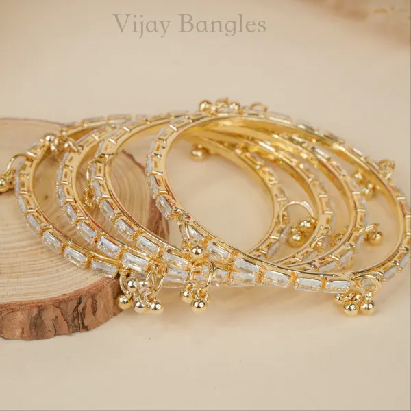 Gold_And_White_Brass_Alloy_Kashmiri_Ad_Stone_Ghungroo_Charm_Bangles_For_Women_Set_Of_4