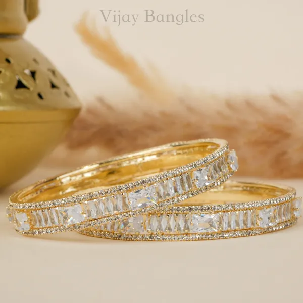 Gold_And_White_Brass_Alloy_Baguette_American_Diamond_Bangles_For_Women_Set_Of_2