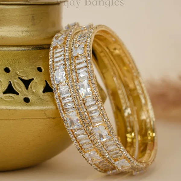 Gold_And_White_Brass_Alloy_Baguette_American_Diamond_Bangles_For_Women_Set_Of_2