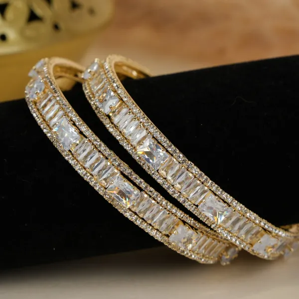Gold_And_White_Brass_Alloy_Baguette_American_Diamond_Bangles_For_Women_Set_Of_2