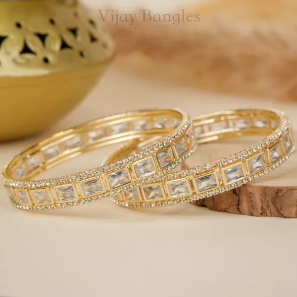 Gold_And_White_Brass_Alloy_Baguette_American_Diamond_Bangles_For_Women_Set_Of_2