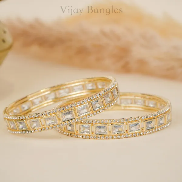 Gold_And_White_Brass_Alloy_Baguette_American_Diamond_Bangles_For_Women_Set_Of_2