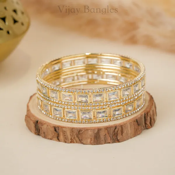 Gold_And_White_Brass_Alloy_Baguette_American_Diamond_Bangles_For_Women_Set_Of_2