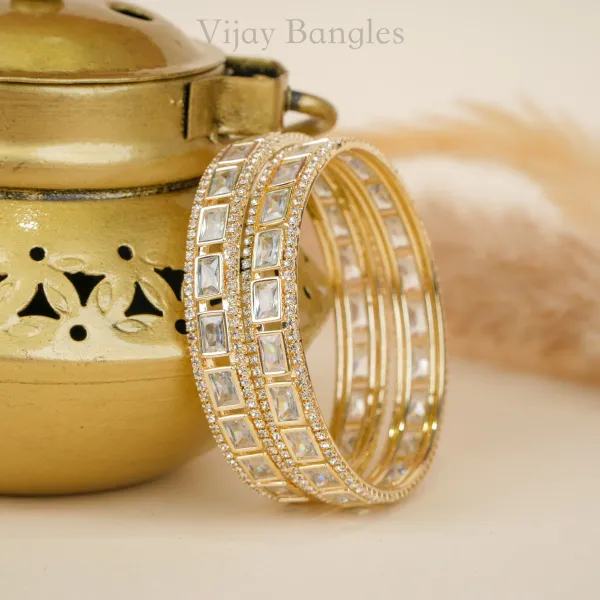 Gold_And_White_Brass_Alloy_Baguette_American_Diamond_Bangles_For_Women_Set_Of_2