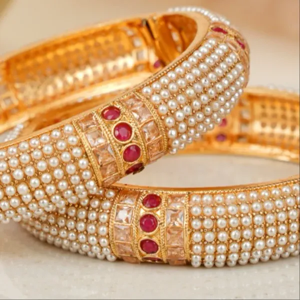 Gold_And_White_Copper_Pearl_Embellished_Festive_Bangles_For_Women_Set_Of_2